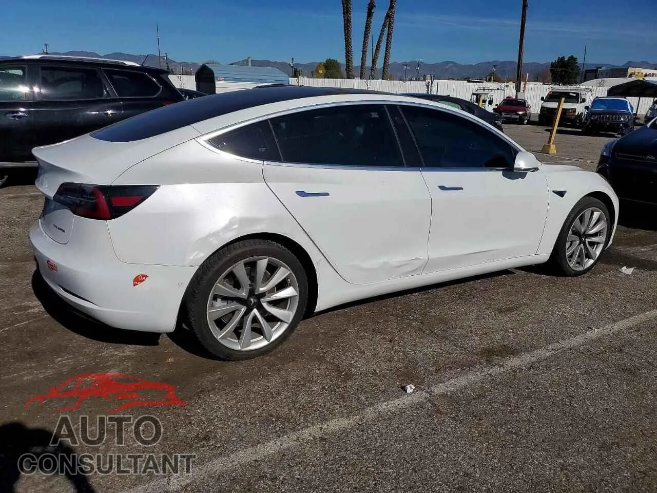 2018 TESLA MODEL 3 Damaged VIN 5YJ3E1EB9JF067682 – side profile