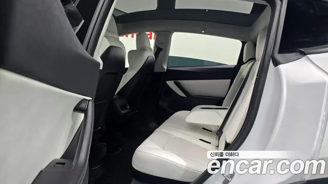 2021 Tesla Model Y Standard Range RWD Sold VIN 5YJYGDED8MF239210 – trunk area