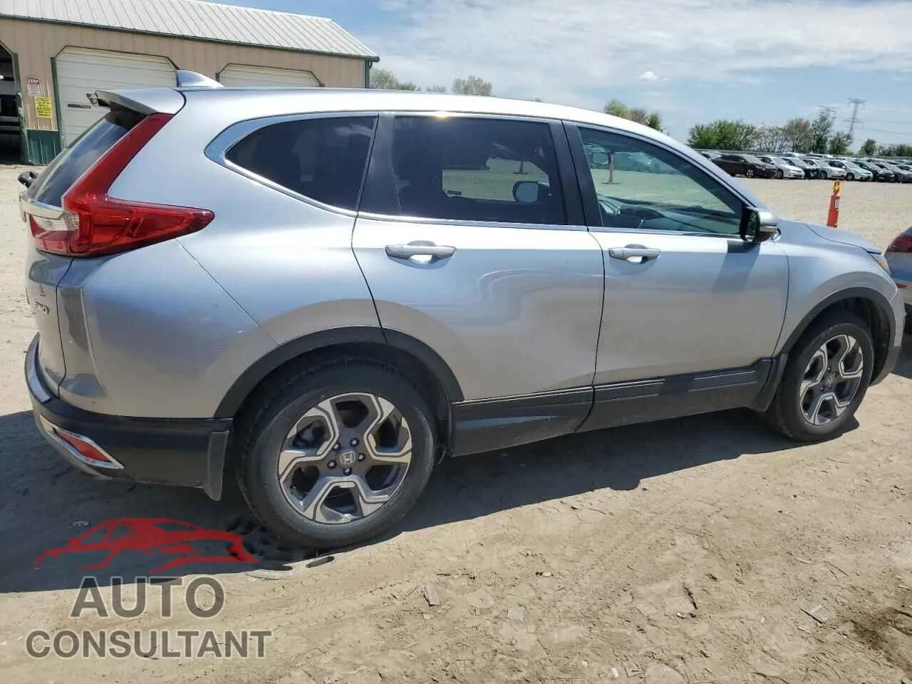 2018 HONDA CRV Damaged VIN 7FARW2H54JE063868 – side profile