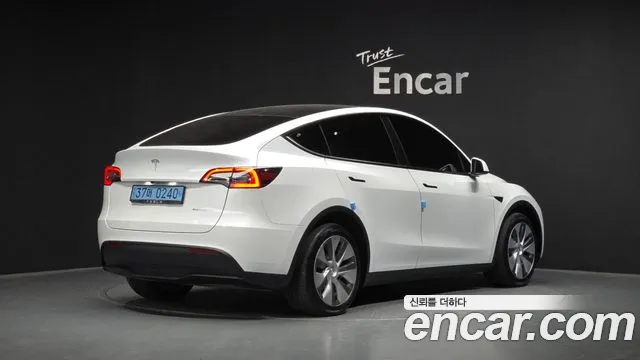 2022 Tesla Model Y Long Range AWD Sold VIN 7SAYGDEE1NF416256 – exterior detail 2022 Tesla Model Y Long Range AWD Sold VIN 7SAYGDEE1NF416256 – exterior detail