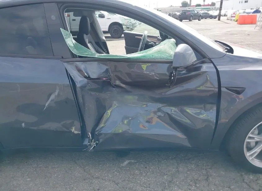 2023 TESLA Model Y Used VIN 7SAYGDEE1PA208653 – rear exterior
