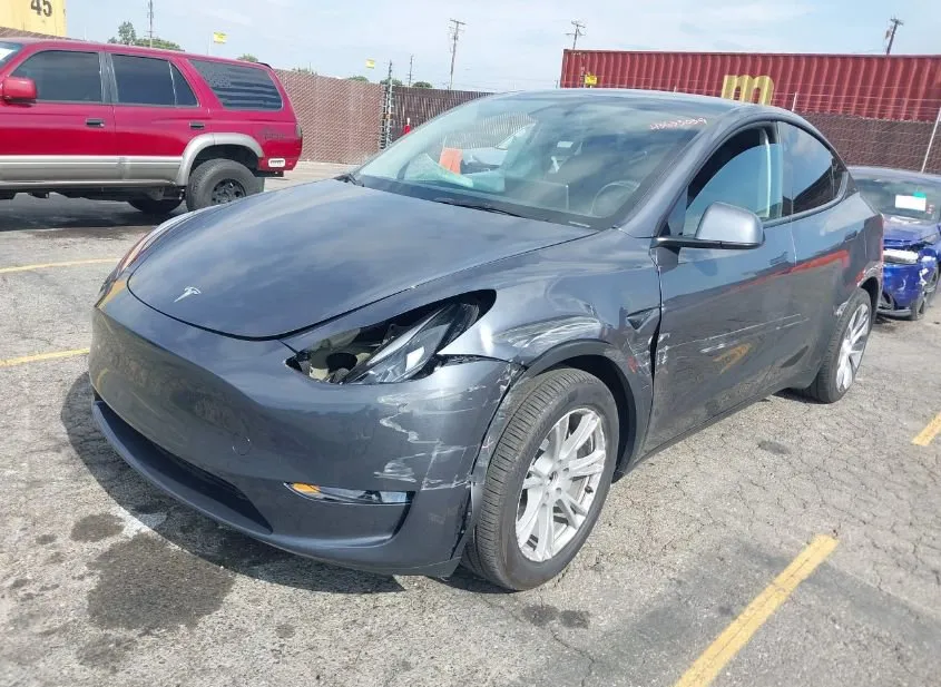 2023 TESLA Model Y Used VIN 7SAYGDEE1PA208653 – interior seats