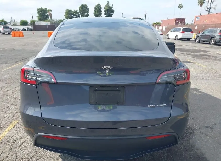 2023 TESLA Model Y Used VIN 7SAYGDEE1PA208653 – engine bay