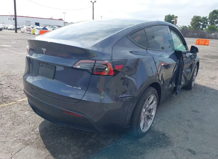 2023 TESLA Model Y Used VIN 7SAYGDEE1PA208653 – exterior detail