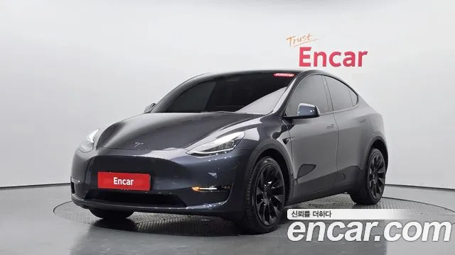 2022 Tesla Model Y Long Range AWD Sold VIN 7SAYGDEE5NF416664 – rear exterior 2022 Tesla Model Y Long Range AWD Sold VIN 7SAYGDEE5NF416664 – rear exterior