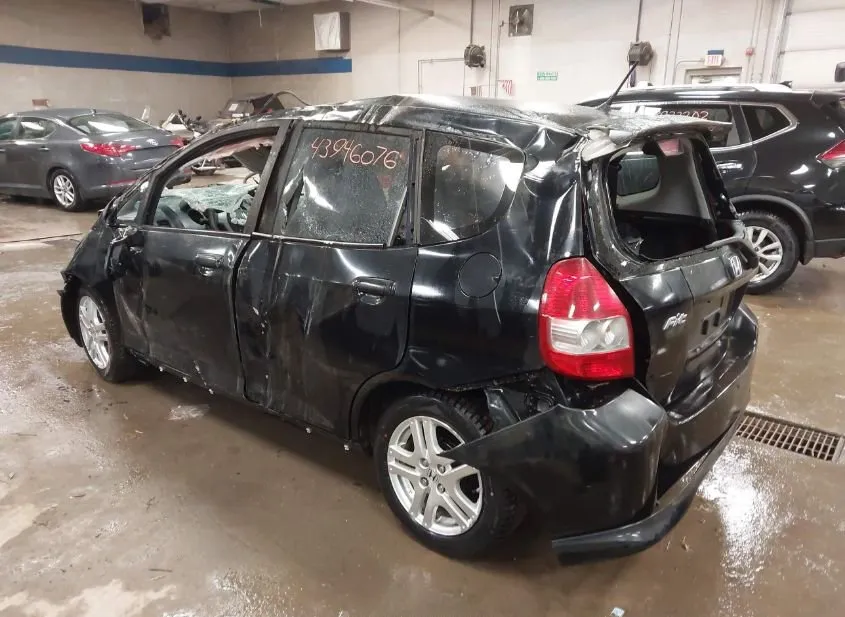 2008 HONDA Fit Used VIN JHMGD38678S032648 – trunk area