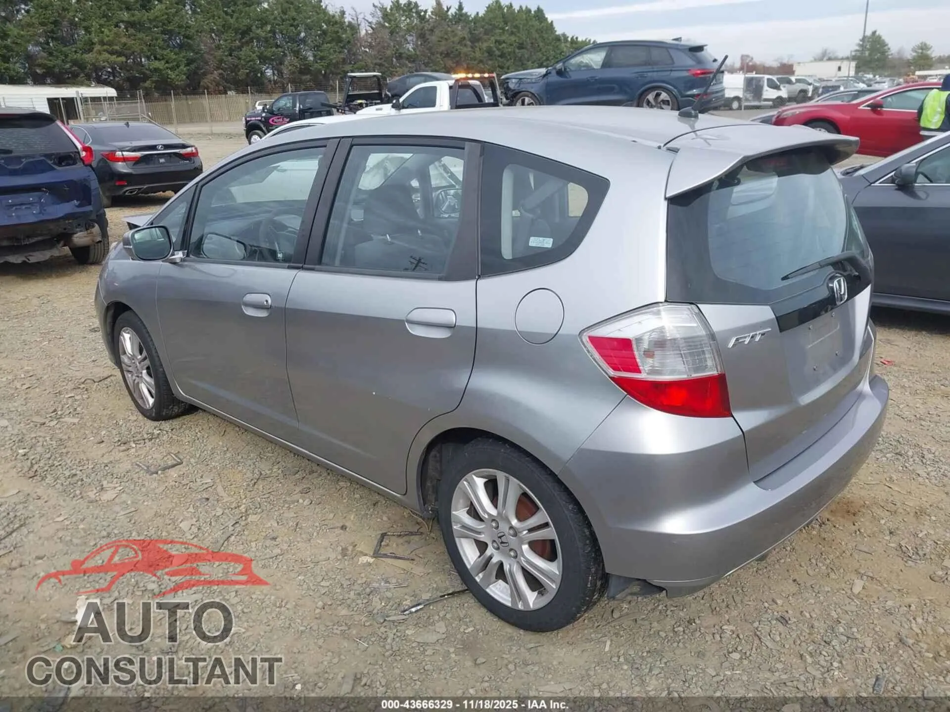 2009 HONDA FIT Damaged VIN JHMGE88239S000658 – side profile