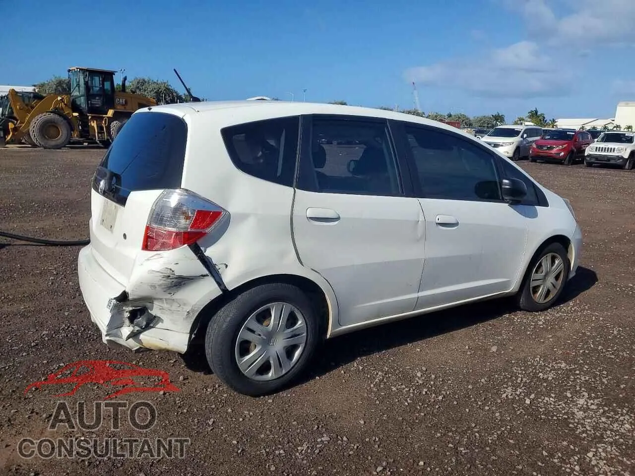 2009 HONDA FIT Damaged VIN JHMGE88239S067115 – side profile