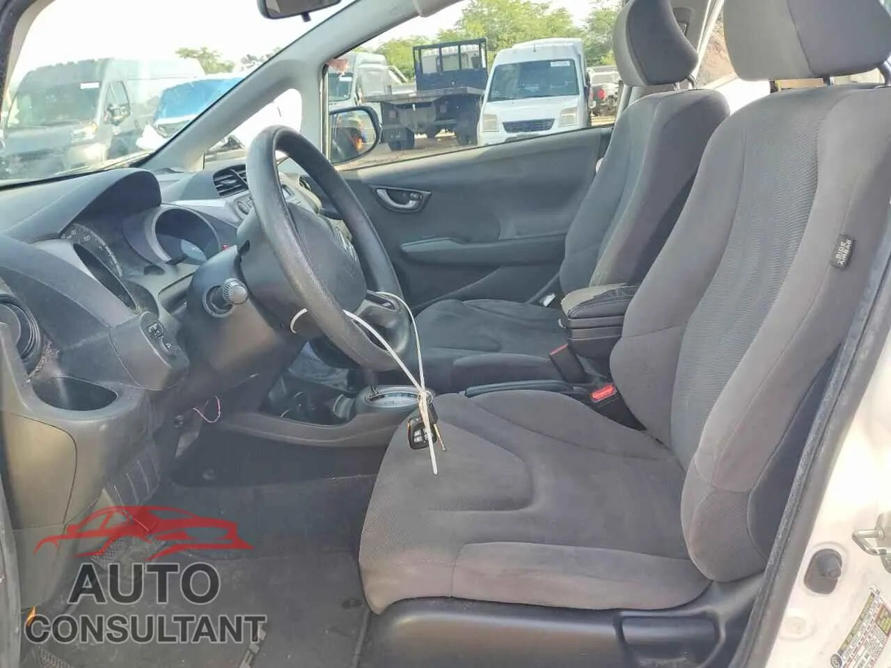 2009 HONDA FIT Damaged VIN JHMGE88239S067115 – exterior detail
