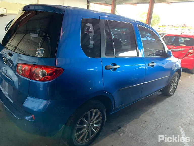 2006 Mazda 2 Used VIN JM0DY10Y270209873 – side profile