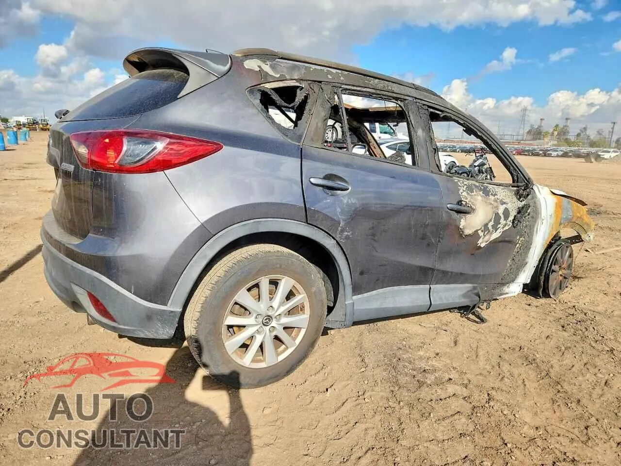 2014 MAZDA CX-5 Damaged VIN JM3KE2CY8E0369095 – side profile