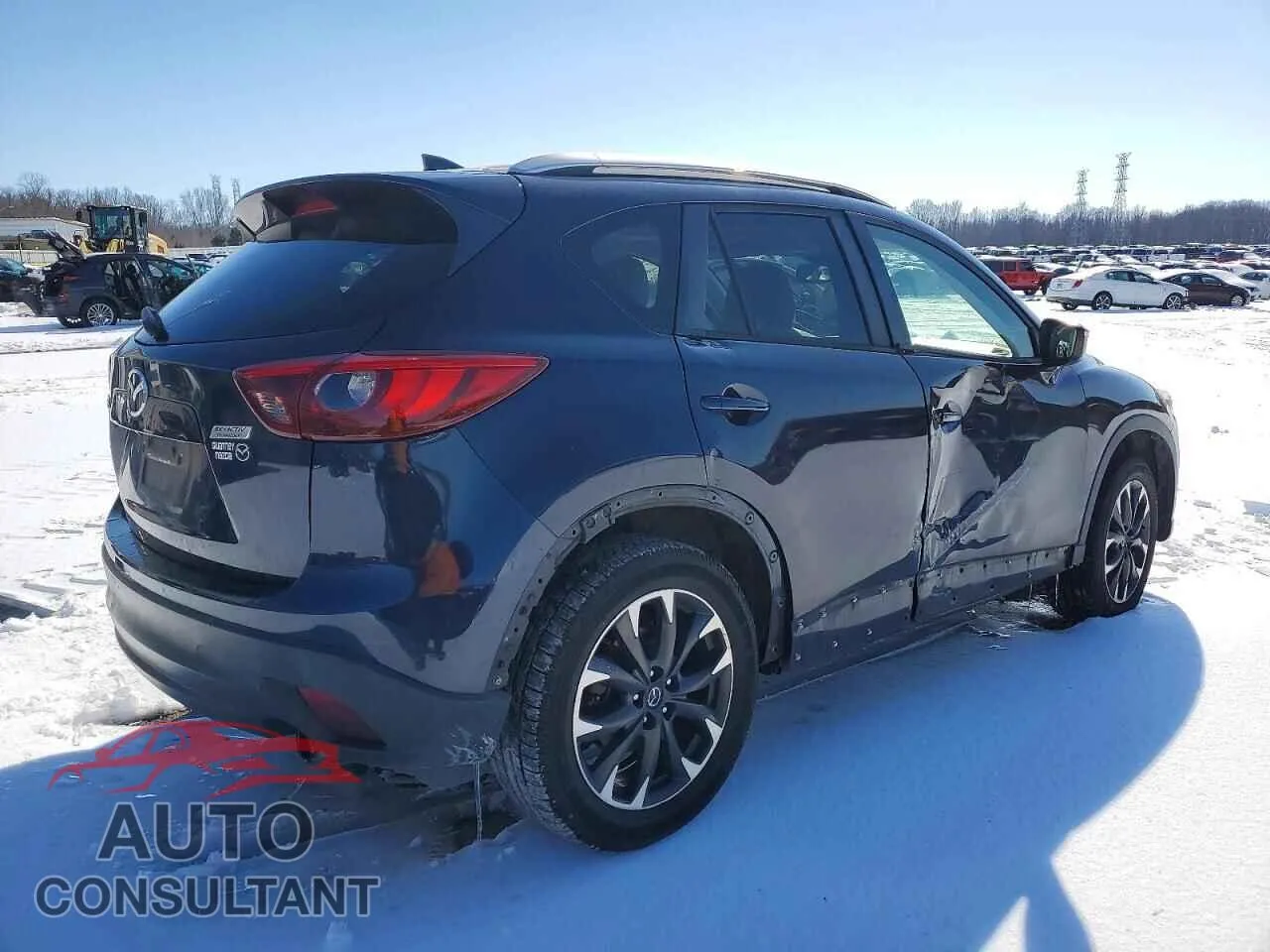 2016 MAZDA CX-5 Damaged VIN JM3KE2DY7G0734920 – side profile