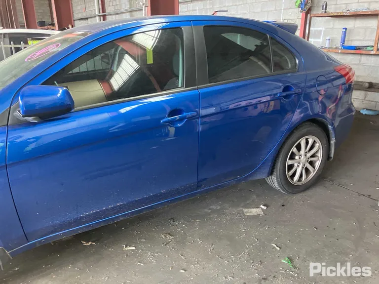 2011 Mitsubishi Lancer Used VIN JMFLTCX4ABU003313 – exterior detail