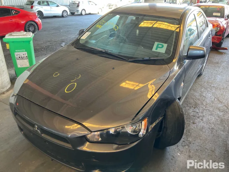 2010 Mitsubishi Lancer Damaged VIN JMFSTCY4AAU005548 – side profile