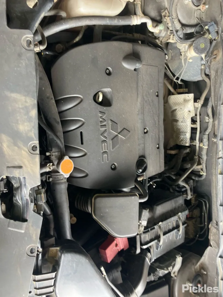 2010 Mitsubishi Outlander Used VIN JMFXTCW5WBZ000398 – interior seats