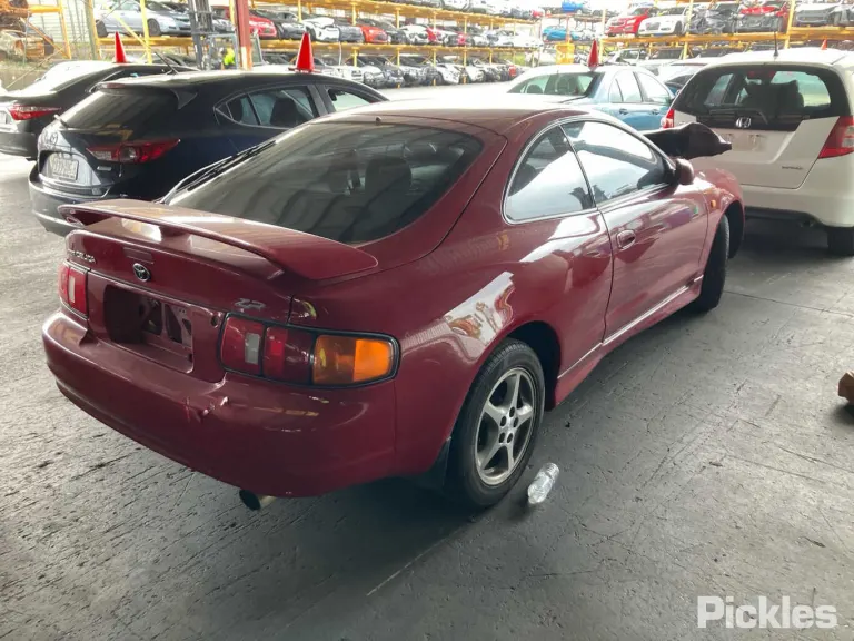 1999 Toyota Celica Damaged VIN JT764STL400054787 – side profile