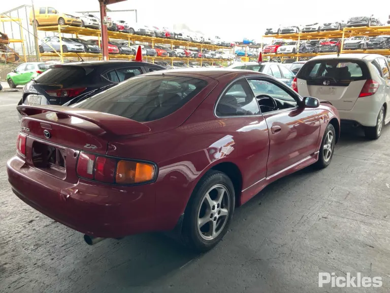 1999 Toyota Celica Damaged VIN JT764STL400054787 – engine bay
