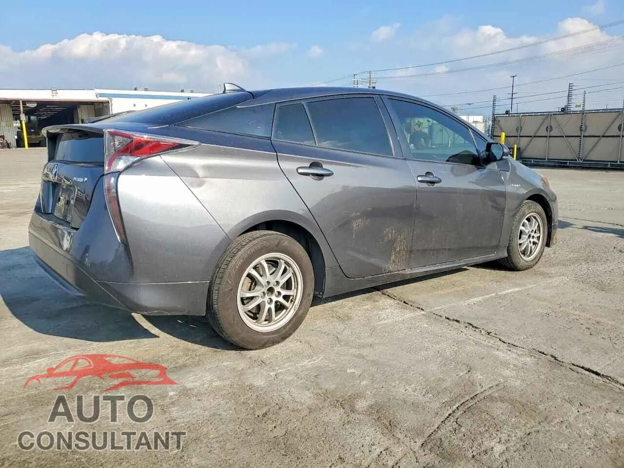 2016 TOYOTA PRIUS Damaged VIN JTDKBRFU4G3524147 – side profile