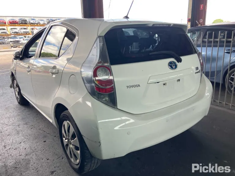 2014 Toyota Prius C Damaged VIN JTDKD3B3801077747 – side profile