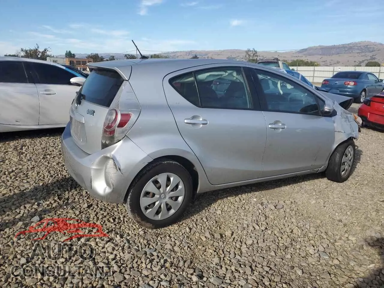 2013 TOYOTA PRIUS Damaged VIN JTDKDTB30D1551308 – side profile