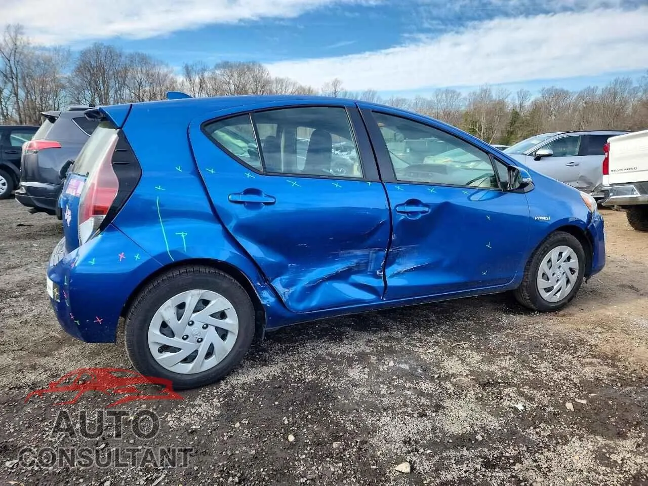 2016 TOYOTA PRIUS Damaged VIN JTDKDTB35G1589315 – side profile