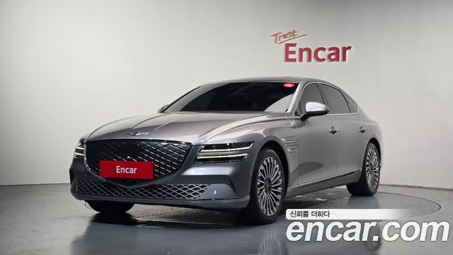 2022 Genesis Electrified G80 (RG3) e-AWD Sold VIN KMTGE411PNU002865 – front exterior 2022 Genesis Electrified G80 (RG3) e-AWD Sold VIN KMTGE411PNU002865 – front exterior