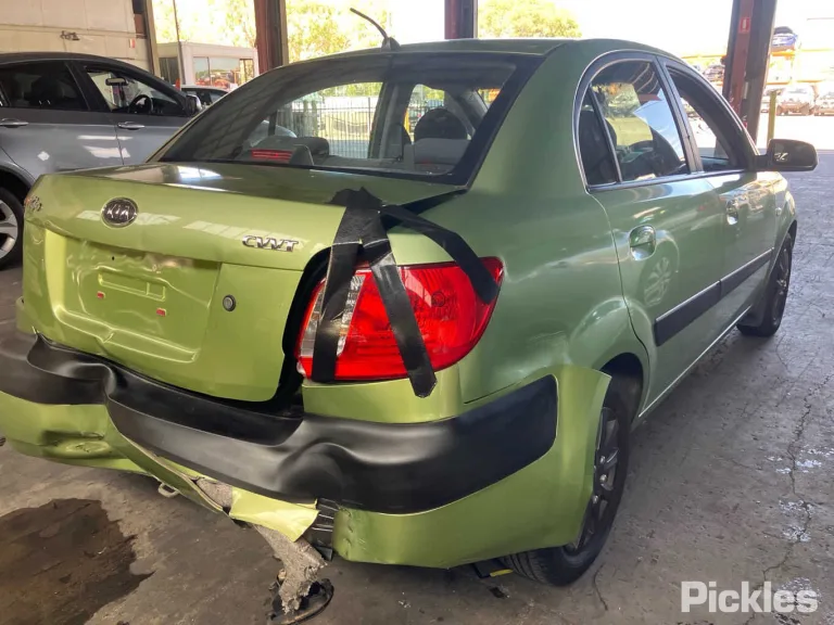 2006 Kia Rio Damaged VIN KNADE223366153785 – side profile