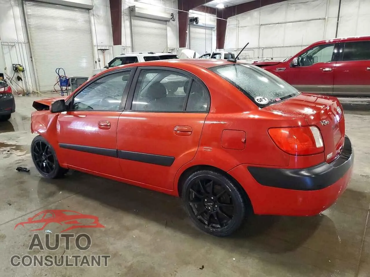 2009 KIA RIO Damaged VIN KNADE223496509635 – rear exterior