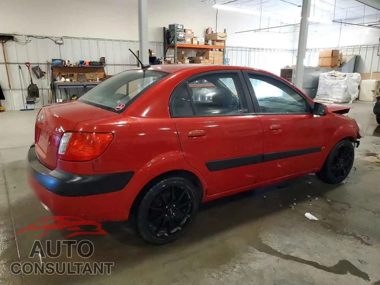 2009 KIA RIO Damaged VIN KNADE223496509635 – side profile