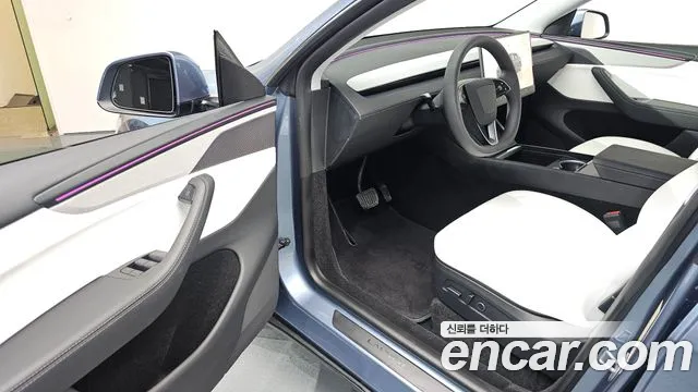 2025 Tesla Model Y Long Range Launch Edition AWD Sold VIN LRWYGCEK6SC977801 – rear exterior