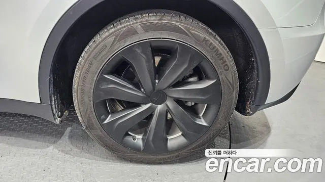2023 Tesla Model Y RWD Sold VIN LRWYGCFS2PC075734 – exterior detail 2023 Tesla Model Y RWD Sold VIN LRWYGCFS2PC075734 – exterior detail