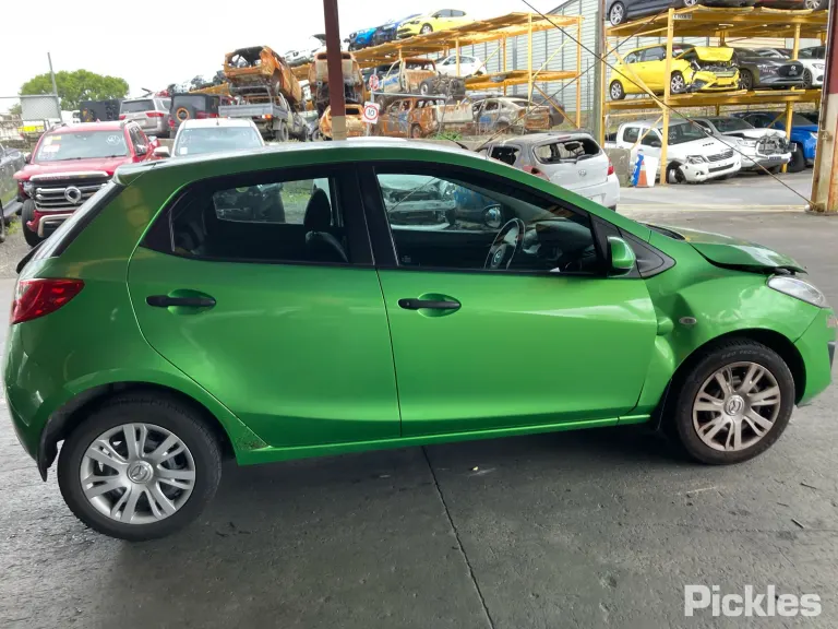 2010 Mazda 2 Damaged VIN MM0DE10Y100139444 – side profile