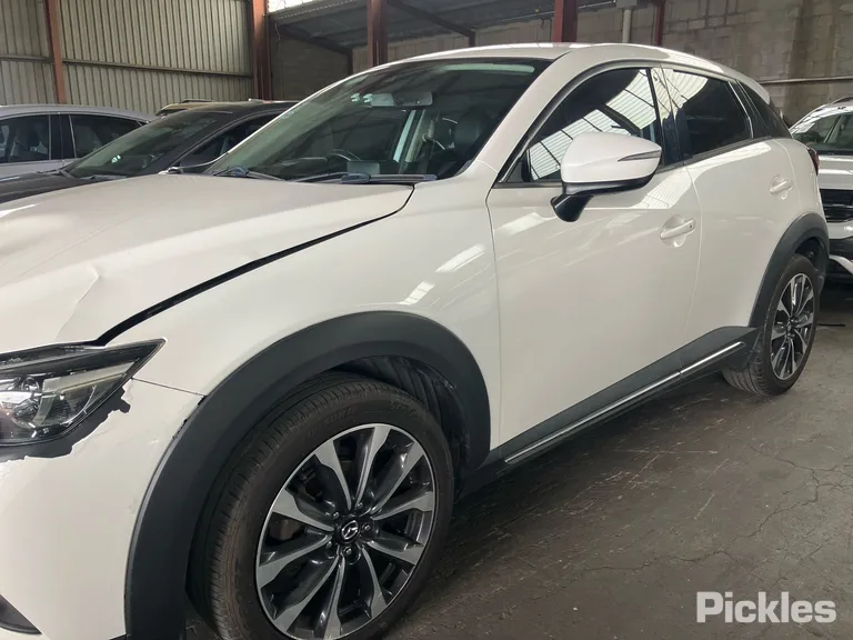 2018 Mazda CX-3 Used VIN MM0DK2W7A0W301586 – side profile