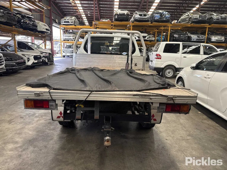 2013 Mitsubishi Triton Used VIN MMAENKA50DD012363 – side profile