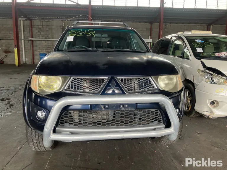 2010 Mitsubishi Triton Damaged VIN MMAJNKB40AD016054 – side profile