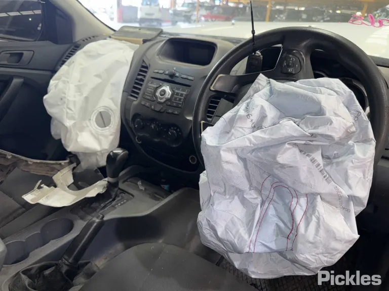 2012 Ford Ranger Damaged VIN MNAUMFF80CW114987 – interior seats