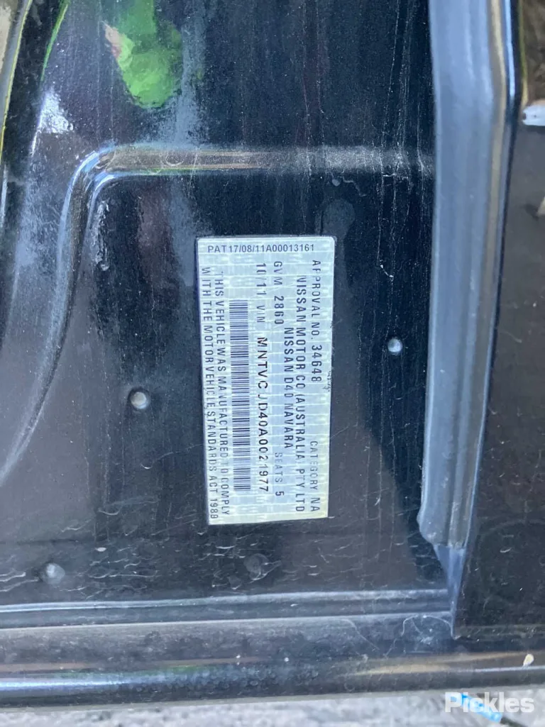 2011 Nissan Navara Damaged VIN MNTVCUD40A0021977 – engine bay