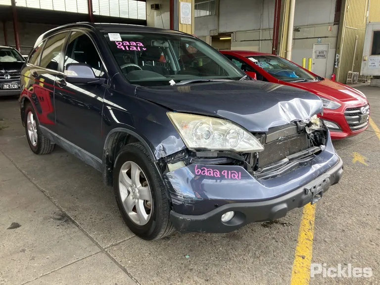 2009 Honda CR-V Used VIN MRHRE48309P010052 – side profile