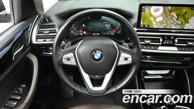 2022 BMW X4 (G02) xDrive20i xLine Sold VIN WBA21DT09N9K44318 – interior seats