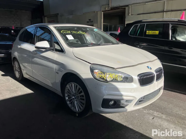 2016 BMW 218i Damaged VIN WBA2A32030V460872 – side profile
