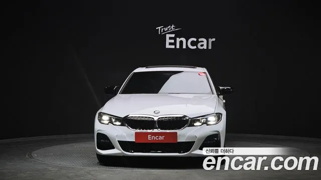 2021 BMW 3 Series (G20) 320i M Sport Sold VIN WBA5X5100MFK21823 – rear exterior 2021 BMW 3 Series (G20) 320i M Sport Sold VIN WBA5X5100MFK21823 – rear exterior