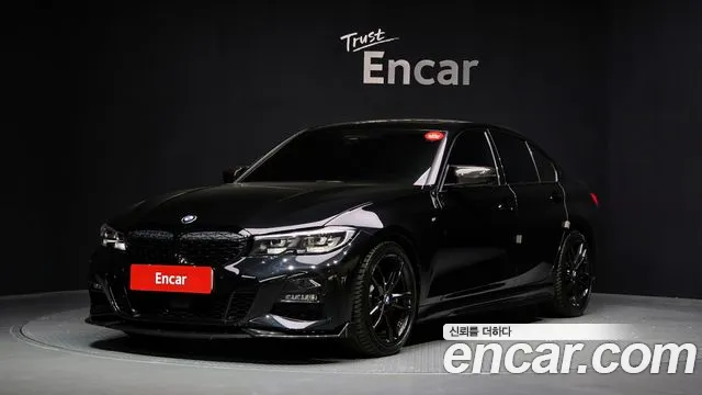 2021 BMW 3 Series (G20) 320i M Sport Sold VIN WBA5X5107MFK21494 – front exterior 2021 BMW 3 Series (G20) 320i M Sport Sold VIN WBA5X5107MFK21494 – front exterior