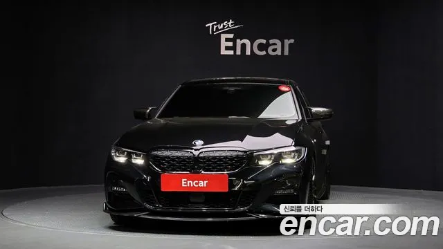 2021 BMW 3 Series (G20) 320i M Sport Sold VIN WBA5X5107MFK21494 – rear exterior 2021 BMW 3 Series (G20) 320i M Sport Sold VIN WBA5X5107MFK21494 – rear exterior