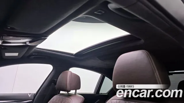 2021 BMW 7 Series (G11) 740i M Sport Sold VIN WBA7R2104MCF96975 – side profile