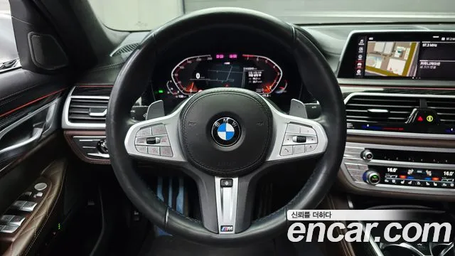 2021 BMW 7 Series (G11) 740Li xDrive M Sport Package Sold VIN WBA7T410XMCG47568 – side profile