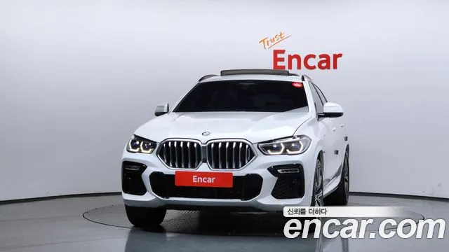 2021 BMW X6 (G06) xDrive40i M Sports Online Exclusive Edition Sold VIN WBACY6102M9G64468 – side profile
