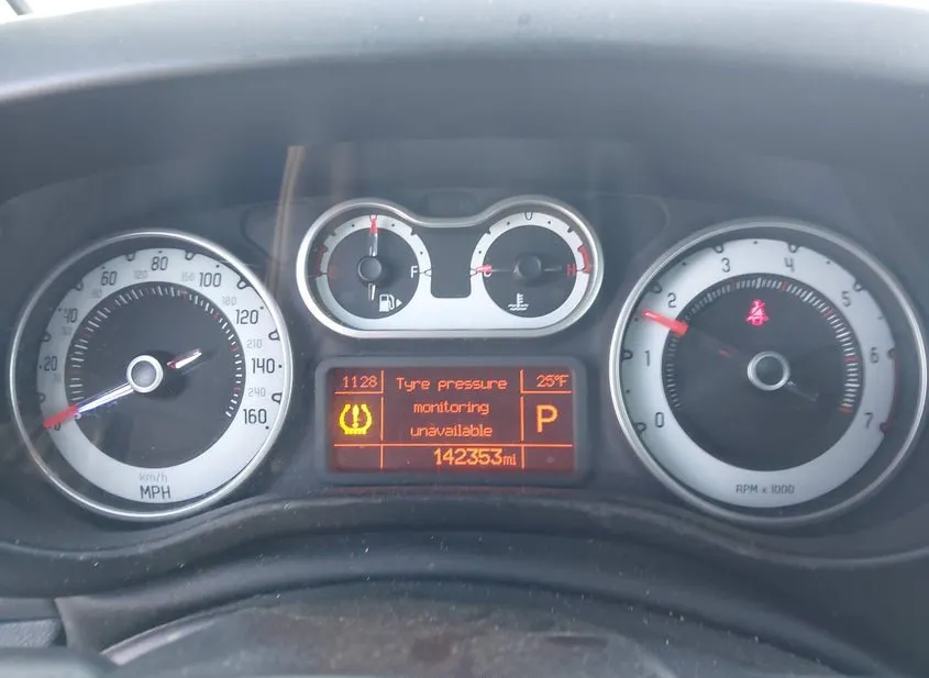 2014 FIAT 500L Used VIN ZFBCFACH7EZ021632 – side profile
